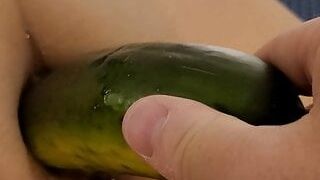 Cucumber in pussy and ass