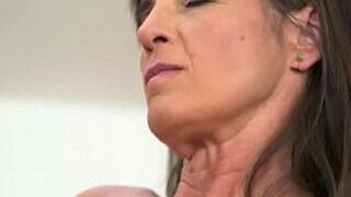 Aged female Mariana railing a lollipop crazy